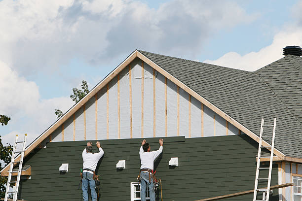 Professional Storm Damage Siding Repair technician working in Maple Plain, MN